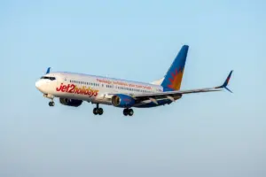 boy calms unruly passenger — US news